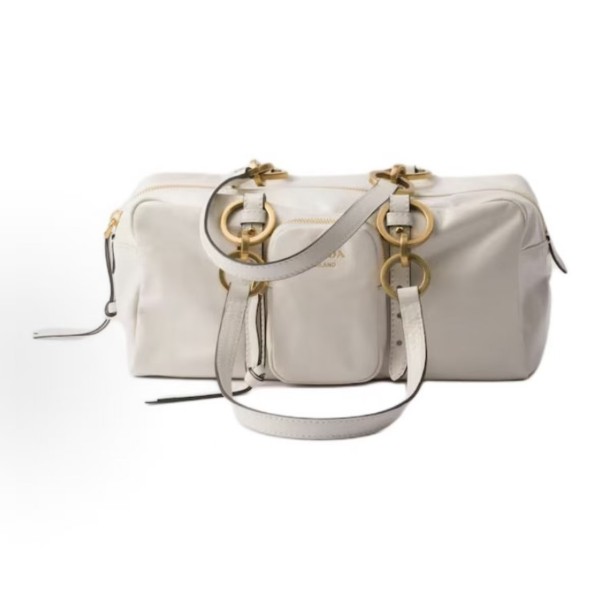 A medium-sized white women\'s handbag with a classic long-handled design from the PRADA Dangle brand